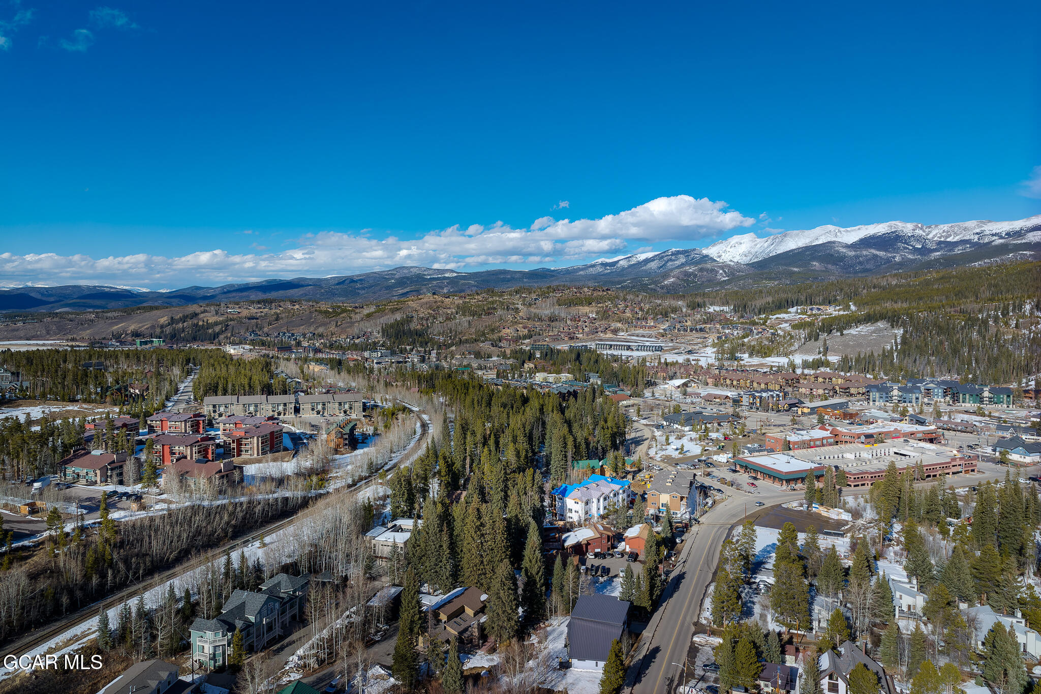 490 Kings Crossing Road, Unit 611 Winter Park, CO 80482 - Photo 7 of 39 a view of a city with mountains in the background