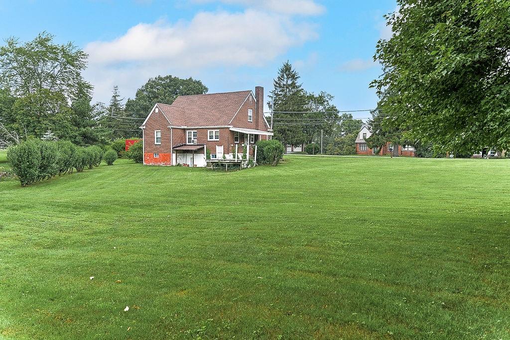 4515 Tuscarawas Road Beaver, PA 15009 - Photo 11 of 50 a view of a house with a big yard