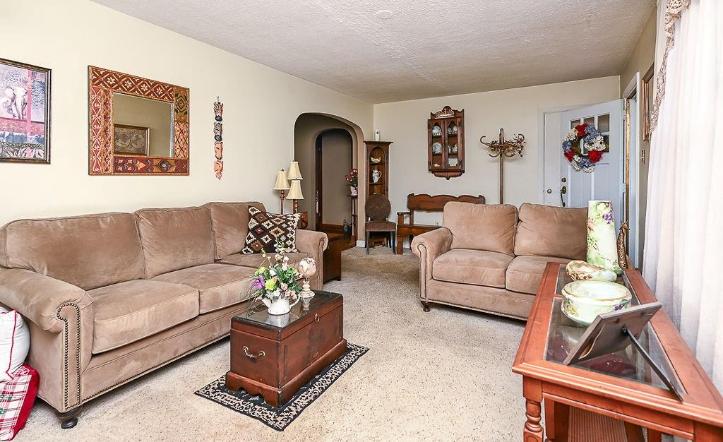 4515 Tuscarawas Road Beaver, PA 15009 - Photo 14 of 50 a living room with furniture or couch and a potted plant