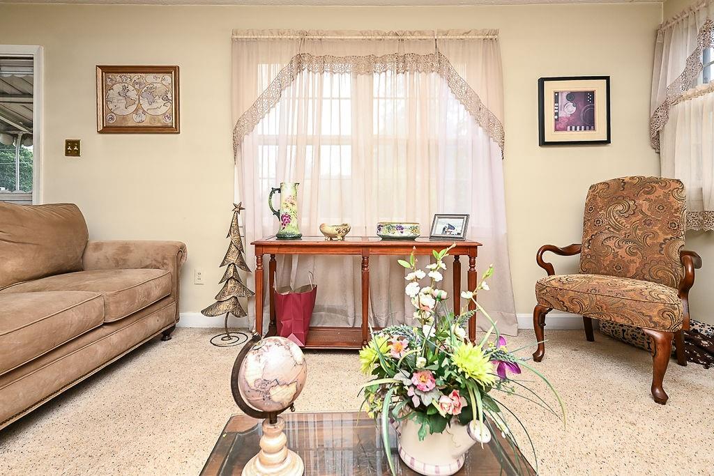 4515 Tuscarawas Road Beaver, PA 15009 - Photo 19 of 50 a living room with furniture and a large window