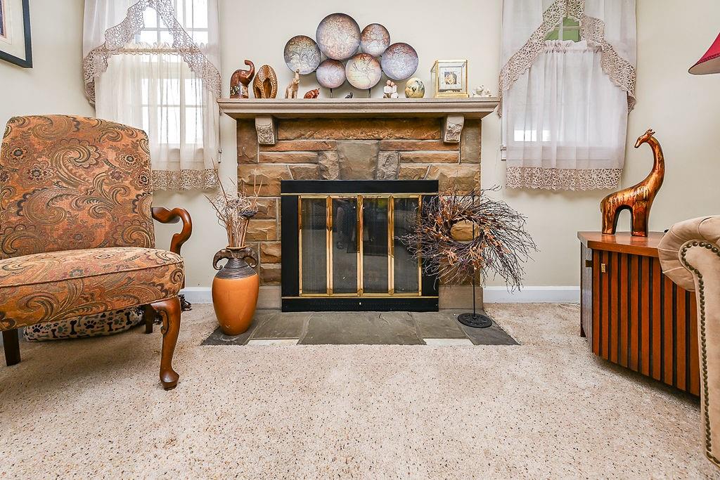 4515 Tuscarawas Road Beaver, PA 15009 - Photo 20 of 50 a living room with furniture and a fireplace