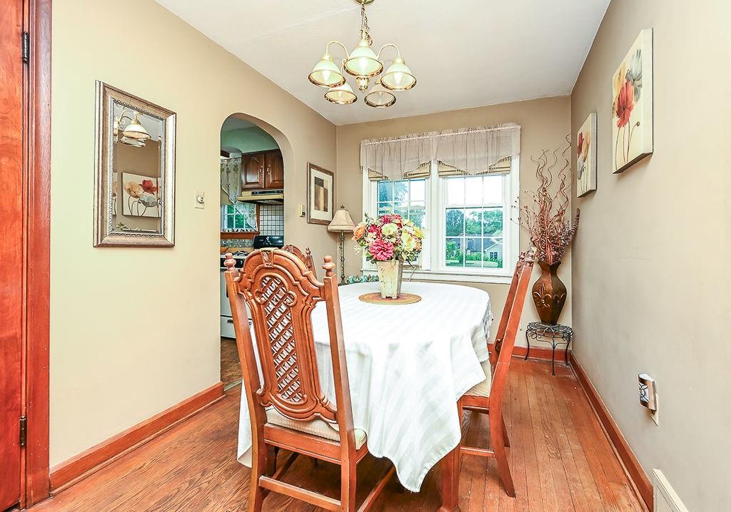 4515 Tuscarawas Road Beaver, PA 15009 - Photo 21 of 50 a view of a dining room with furniture wooden floor and chandelier