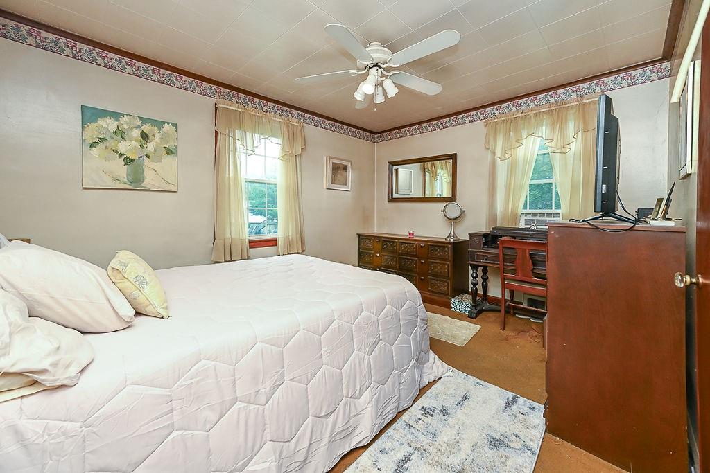 4515 Tuscarawas Road Beaver, PA 15009 - Photo 30 of 50 a bedroom with a bed and a table