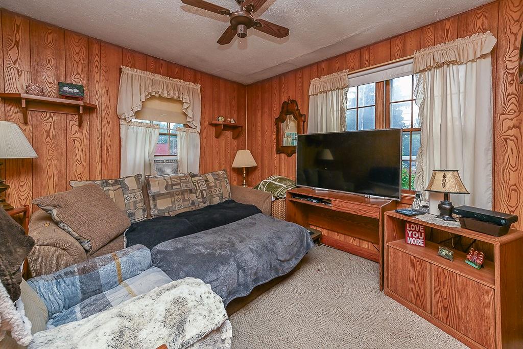 4515 Tuscarawas Road Beaver, PA 15009 - Photo 33 of 50 a living room with furniture and a flat screen tv