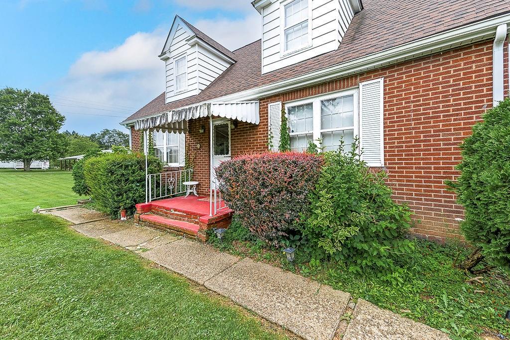 4515 Tuscarawas Road Beaver, PA 15009 - Photo 4 of 50 a front view of a house with garden
