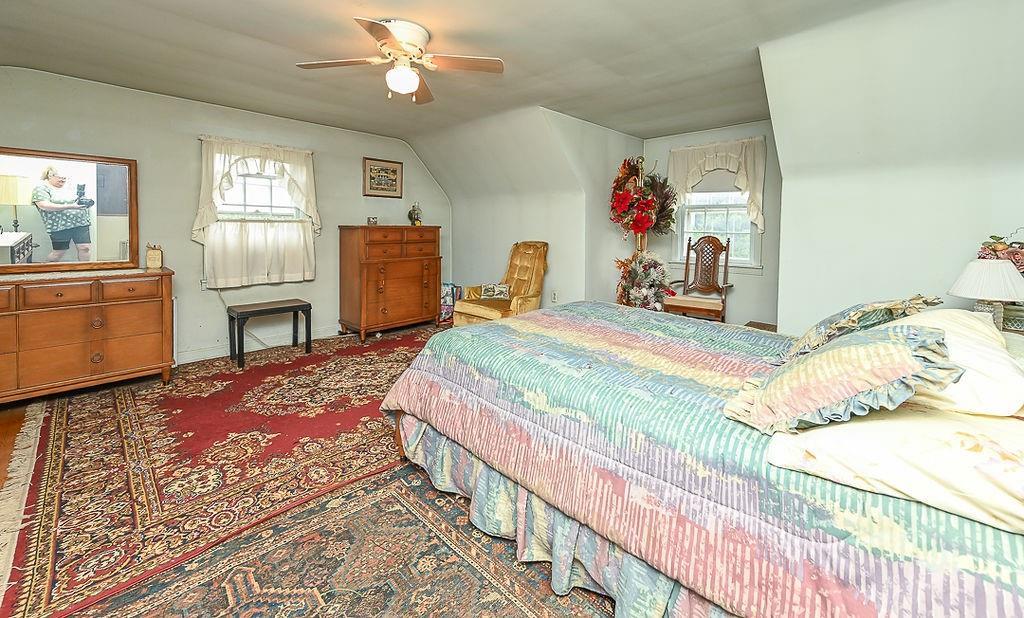4515 Tuscarawas Road Beaver, PA 15009 - Photo 41 of 50 a bedroom with a bed dresser and a window