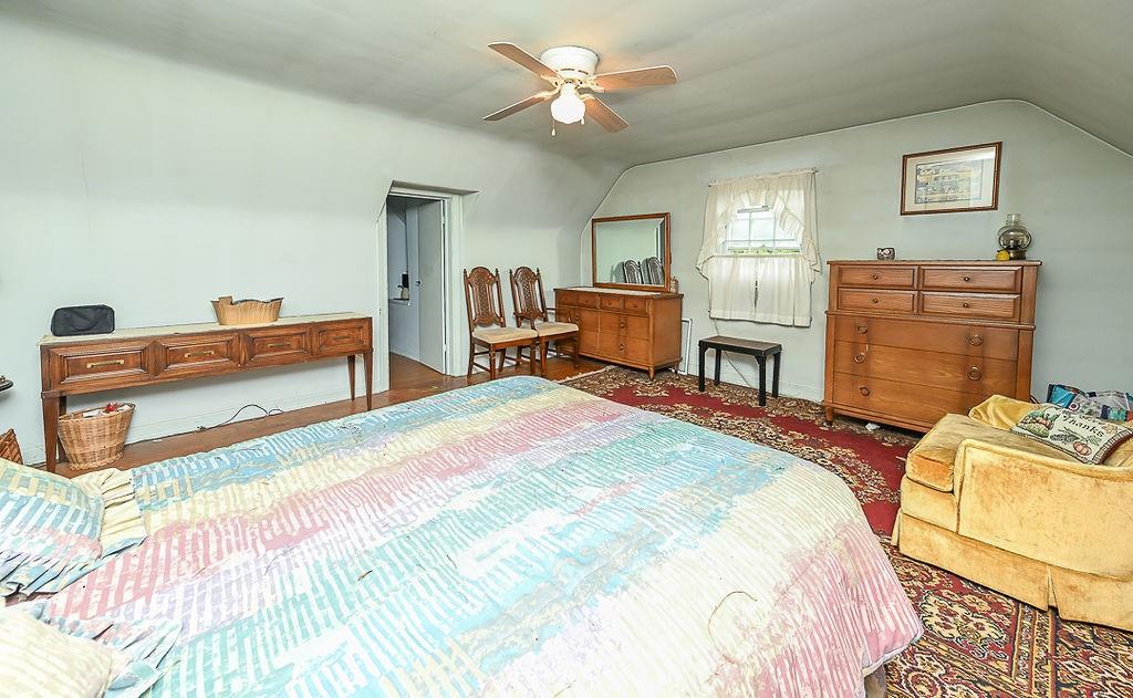 4515 Tuscarawas Road Beaver, PA 15009 - Photo 42 of 50 a bedroom with a bed and wooden floor