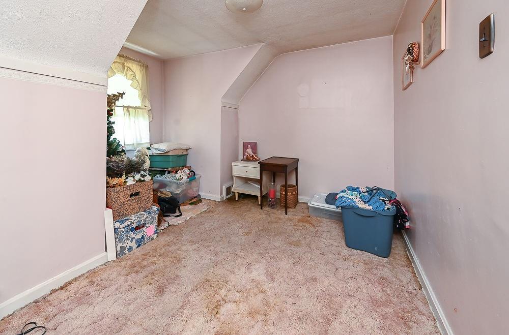 4515 Tuscarawas Road Beaver, PA 15009 - Photo 44 of 50 a room with furniture and a window