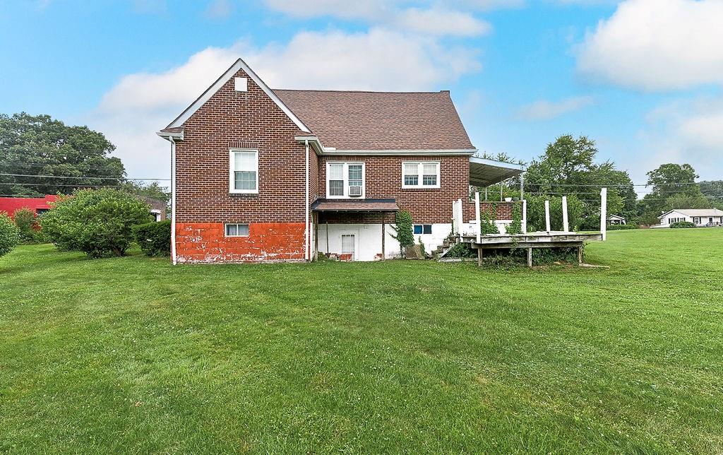 4515 Tuscarawas Road Beaver, PA 15009 - Photo 9 of 50 a front view of house with yard and green space