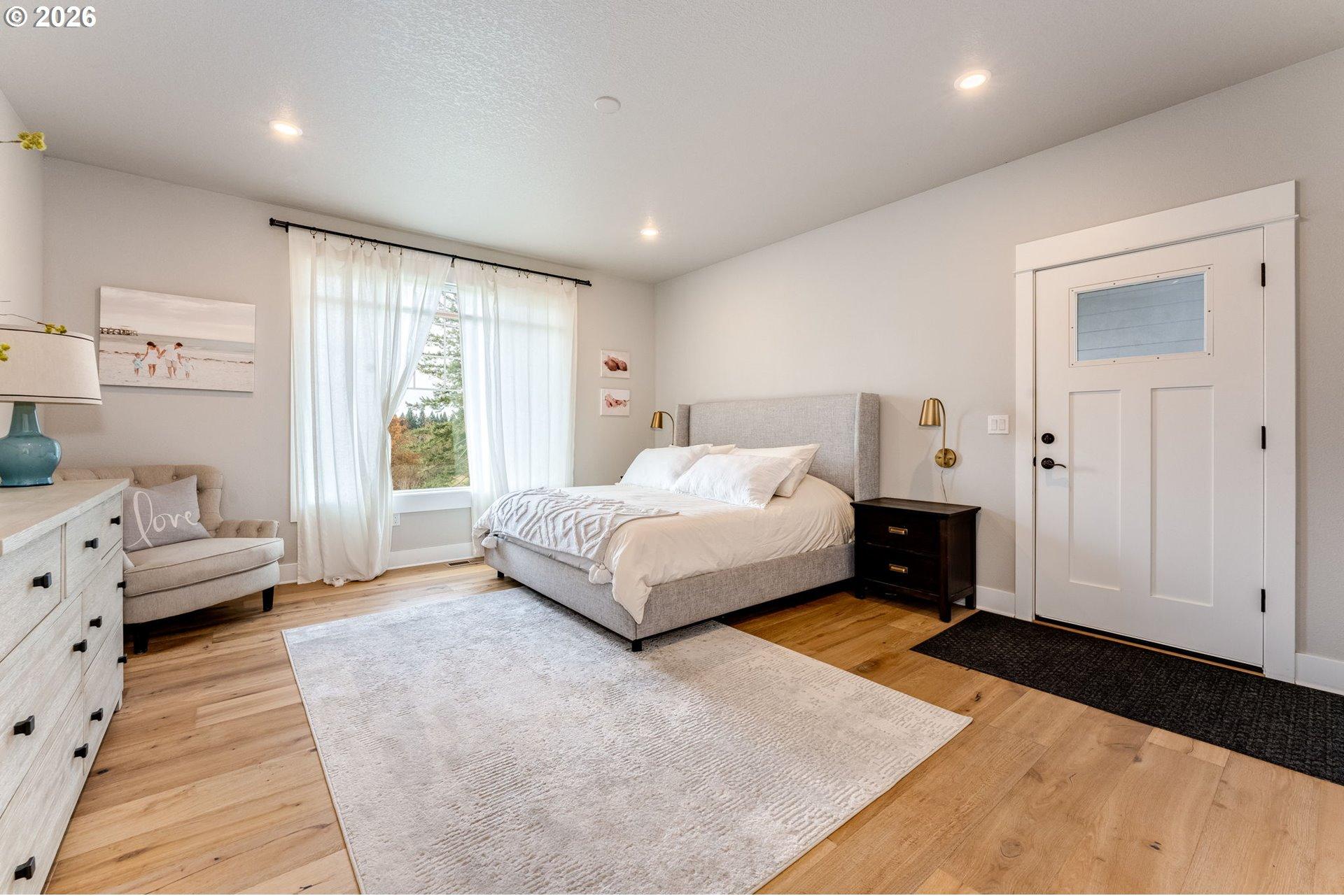 701 Northwest 184th Street Ridgefield, WA 98642 - Photo 14 of 48 Primary Bedroom