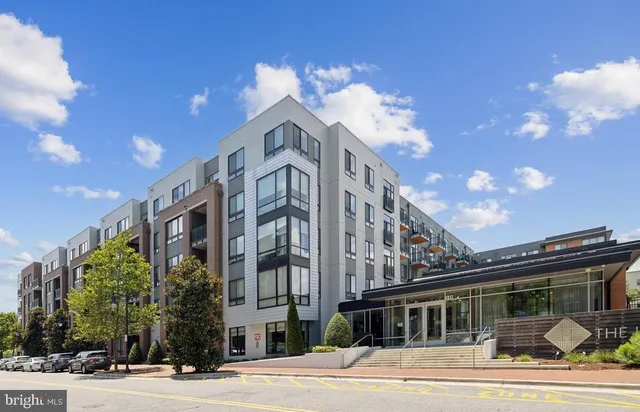 a view of a building with a street
