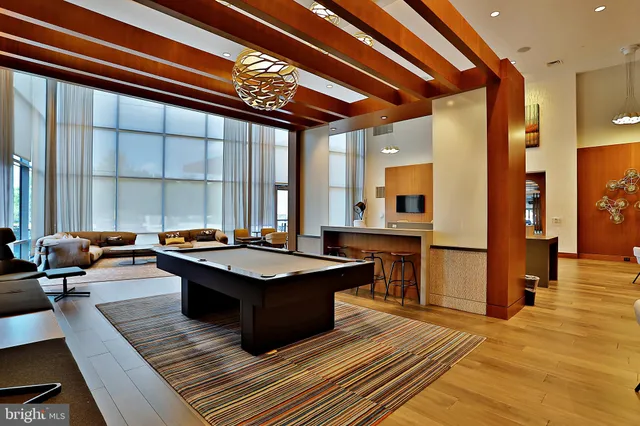 a room with lots of table and chairs