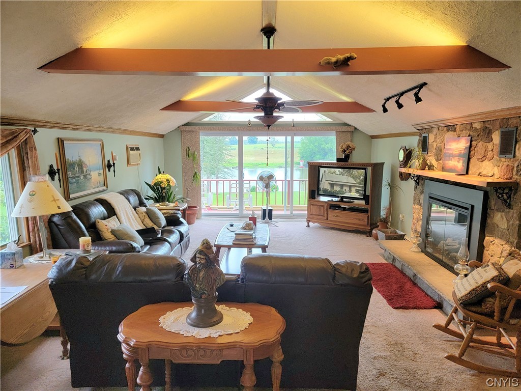 10026 Jordan Road Cato, NY 13080 - Photo 15 of 38 CATHEDRAL LIVING ROOM WITH SLIDING DOOR