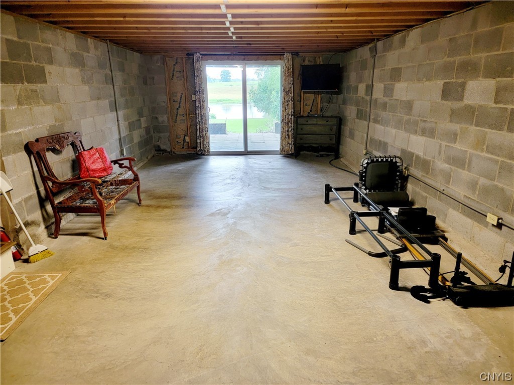 10026 Jordan Road Cato, NY 13080 - Photo 27 of 38 All purpose room in basement with walkout