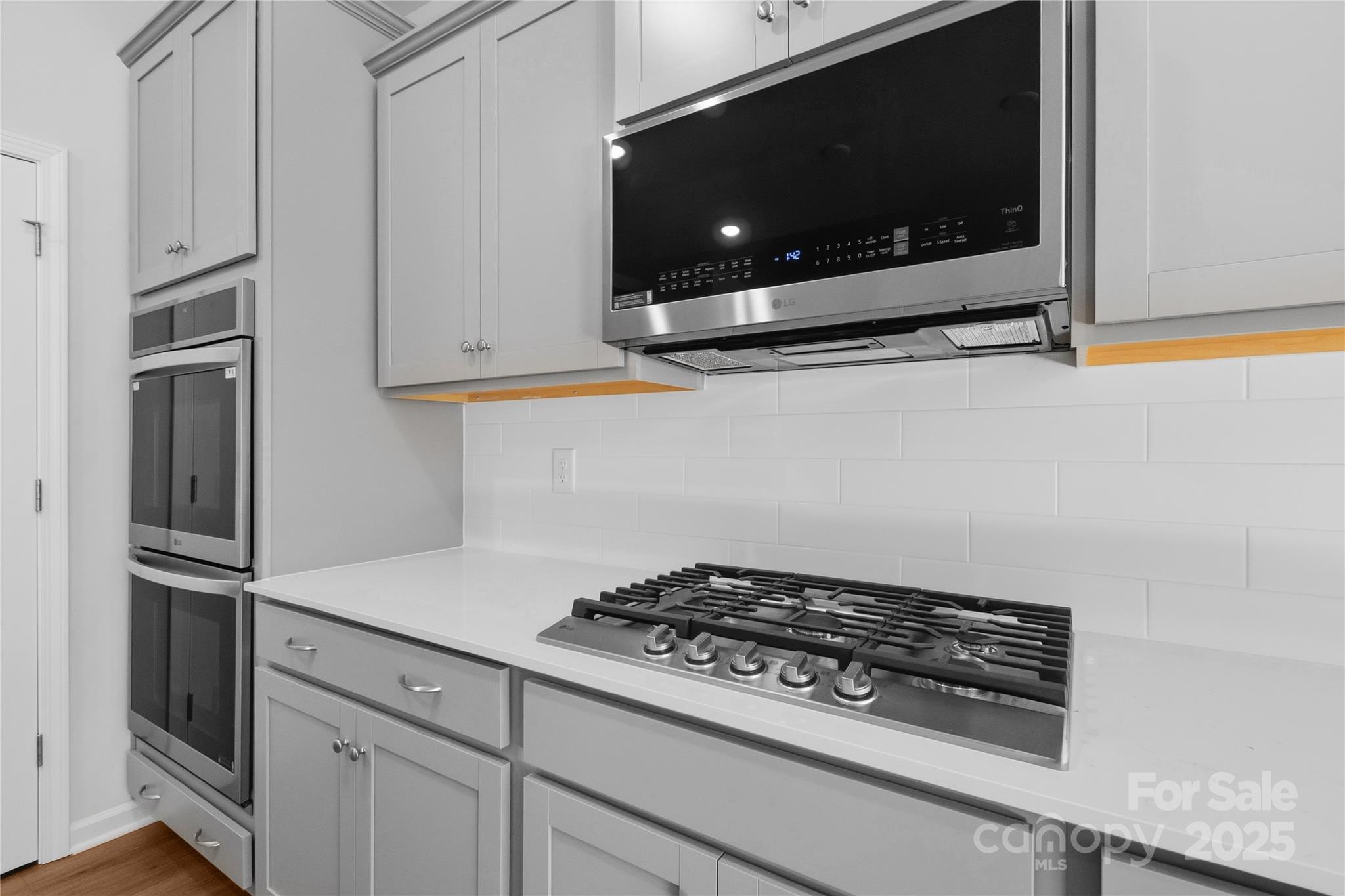 3322 Amarillo Court Lancaster, SC 29720 - Photo 11 of 30 a stove top oven sitting inside of a kitchen