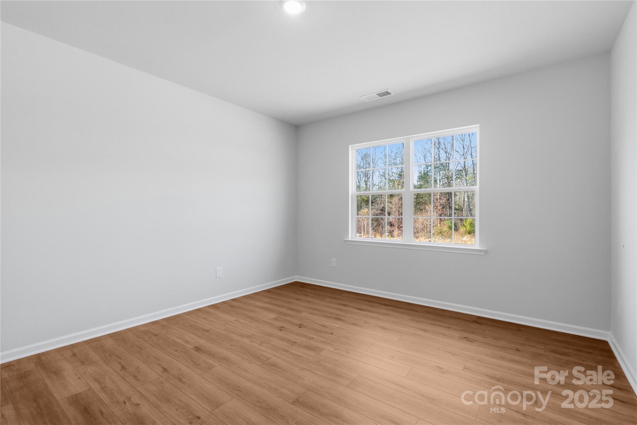 3322 Amarillo Court Lancaster, SC 29720 - Photo 9 of 30 an empty room with a window