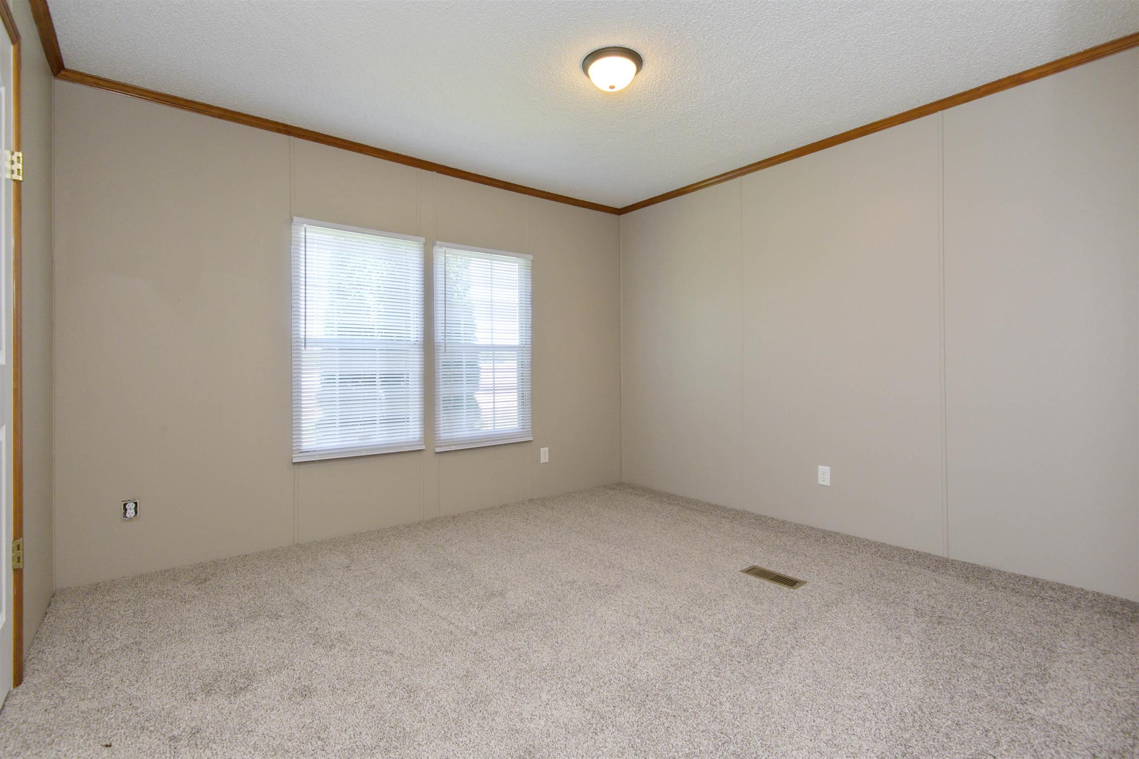 4489 Goodman Road Adams, TN 37010 - Photo 14 of 30 a view of an empty room with a window