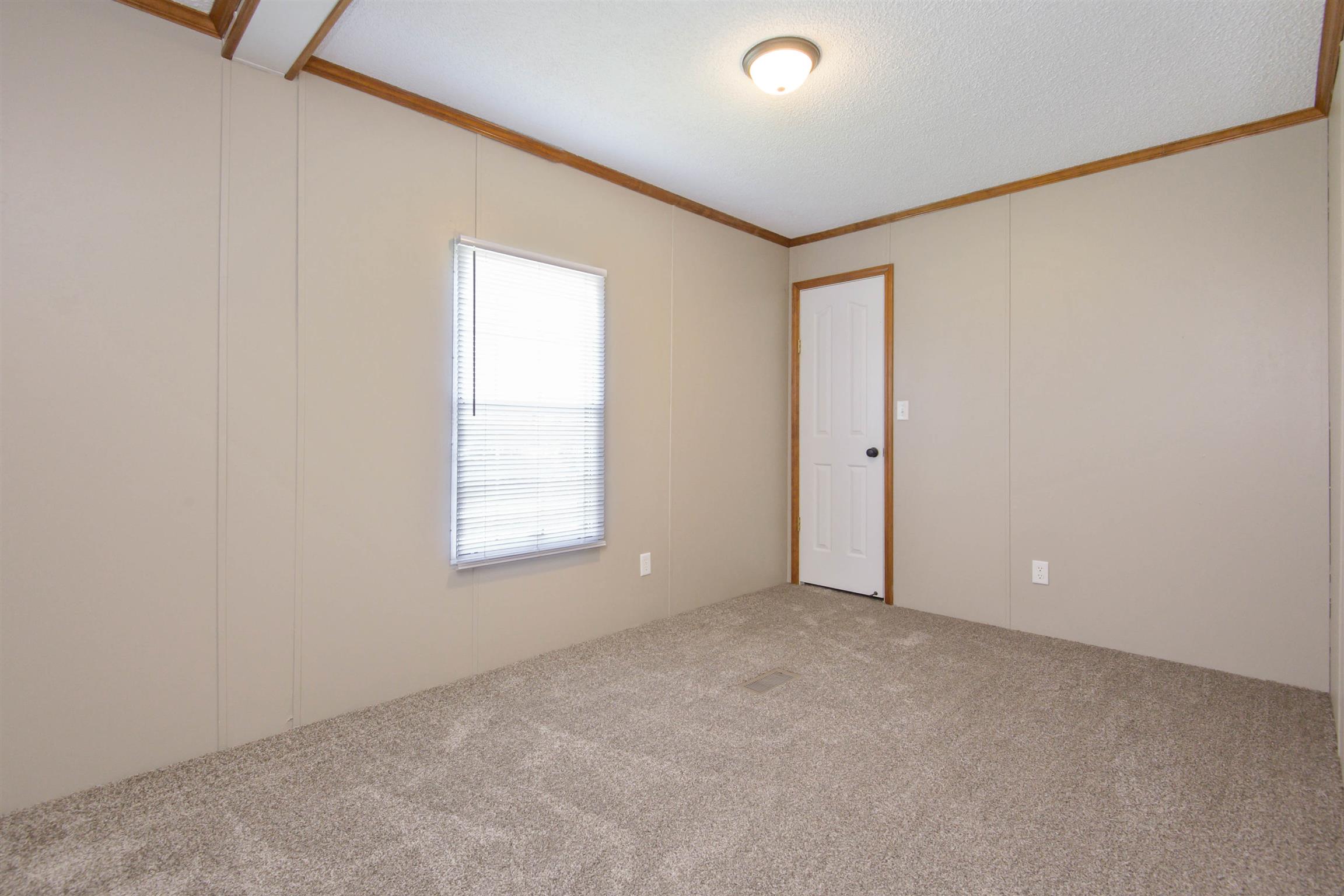 4489 Goodman Road Adams, TN 37010 - Photo 17 of 30 an empty room with windows