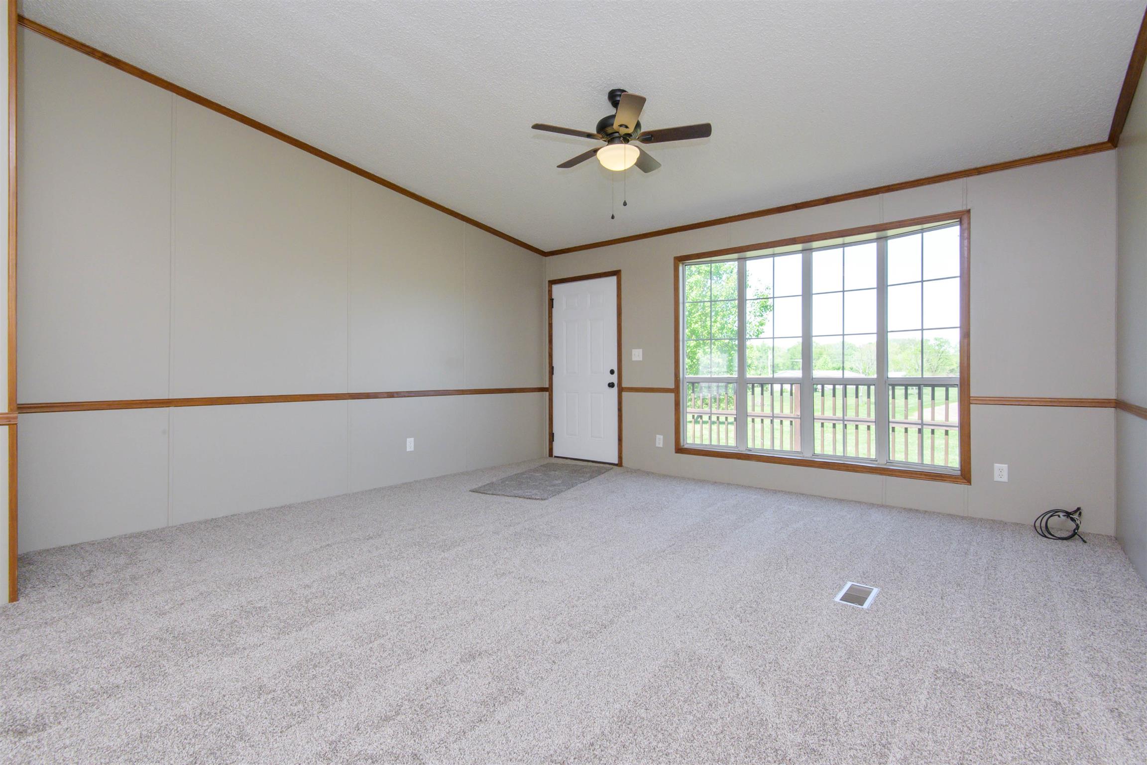 4489 Goodman Road Adams, TN 37010 - Photo 4 of 30 a view of an empty room with a window