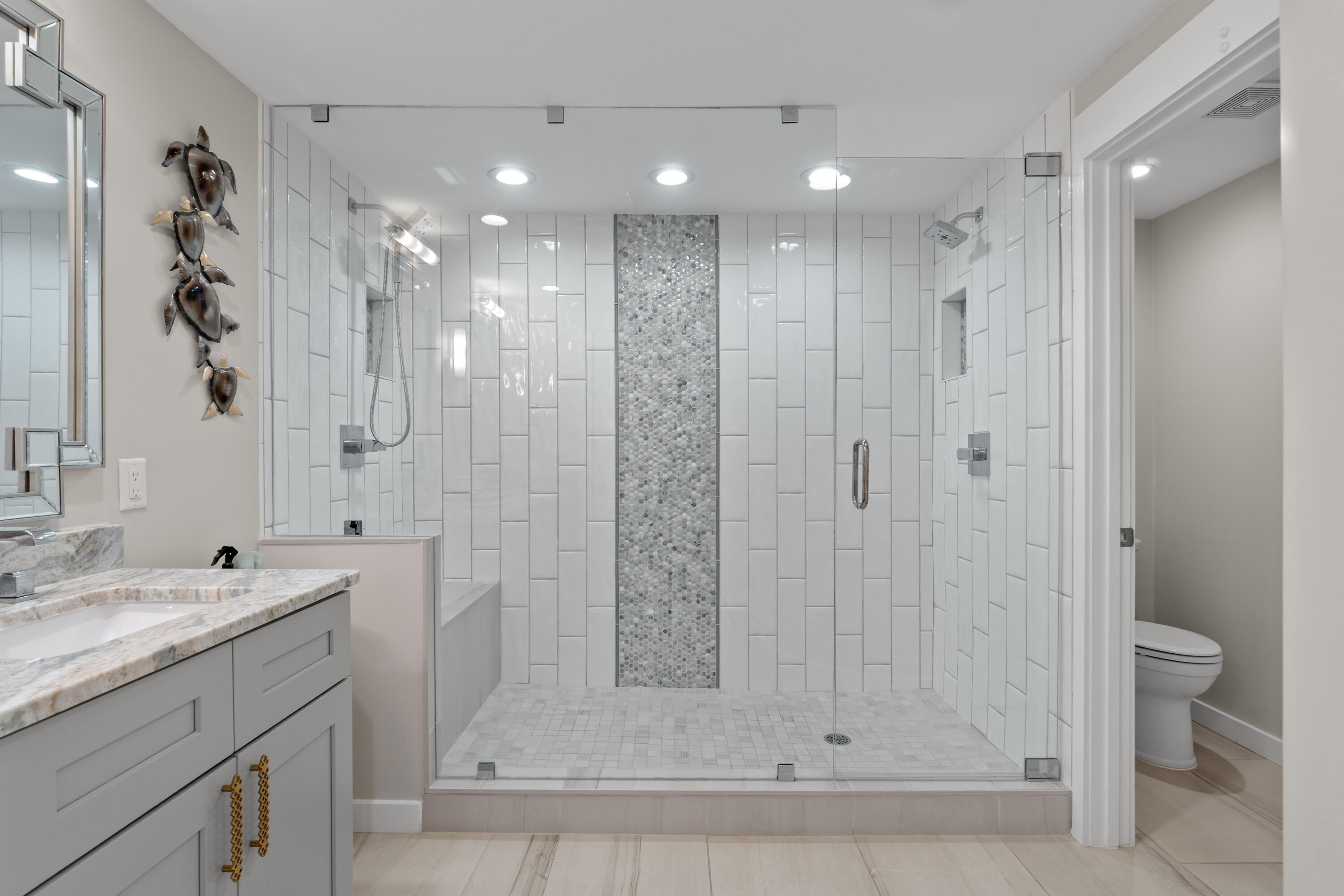 32461 East County Highway 30A, Unit 330 Inlet Beach, FL 32461 - Photo 15 of 31 a bathroom with a granite countertop sink a toilet and shower