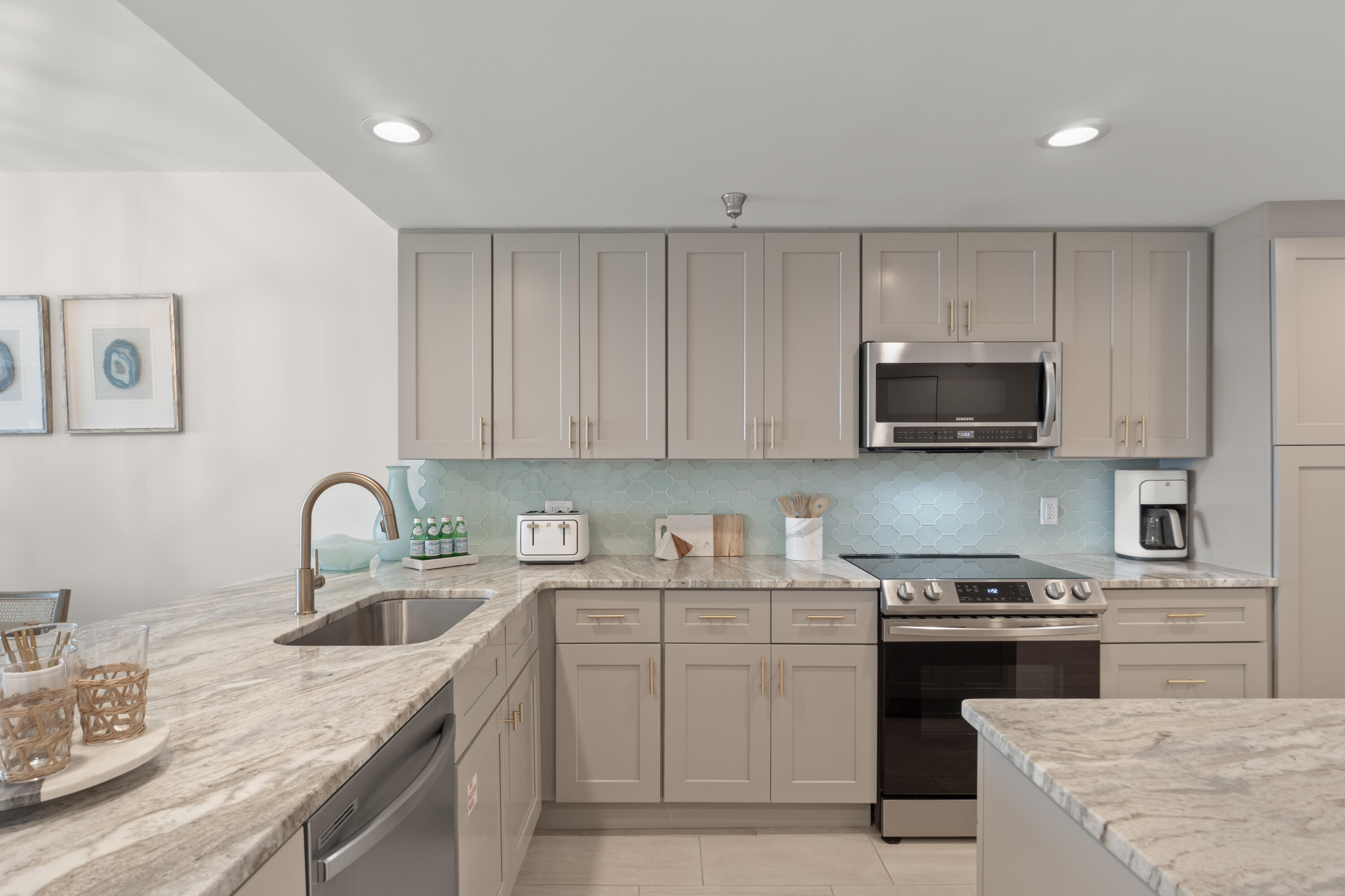 32461 East County Highway 30A, Unit 330 Inlet Beach, FL 32461 - Photo 2 of 31 a kitchen with granite countertop a sink a stove and cabinets