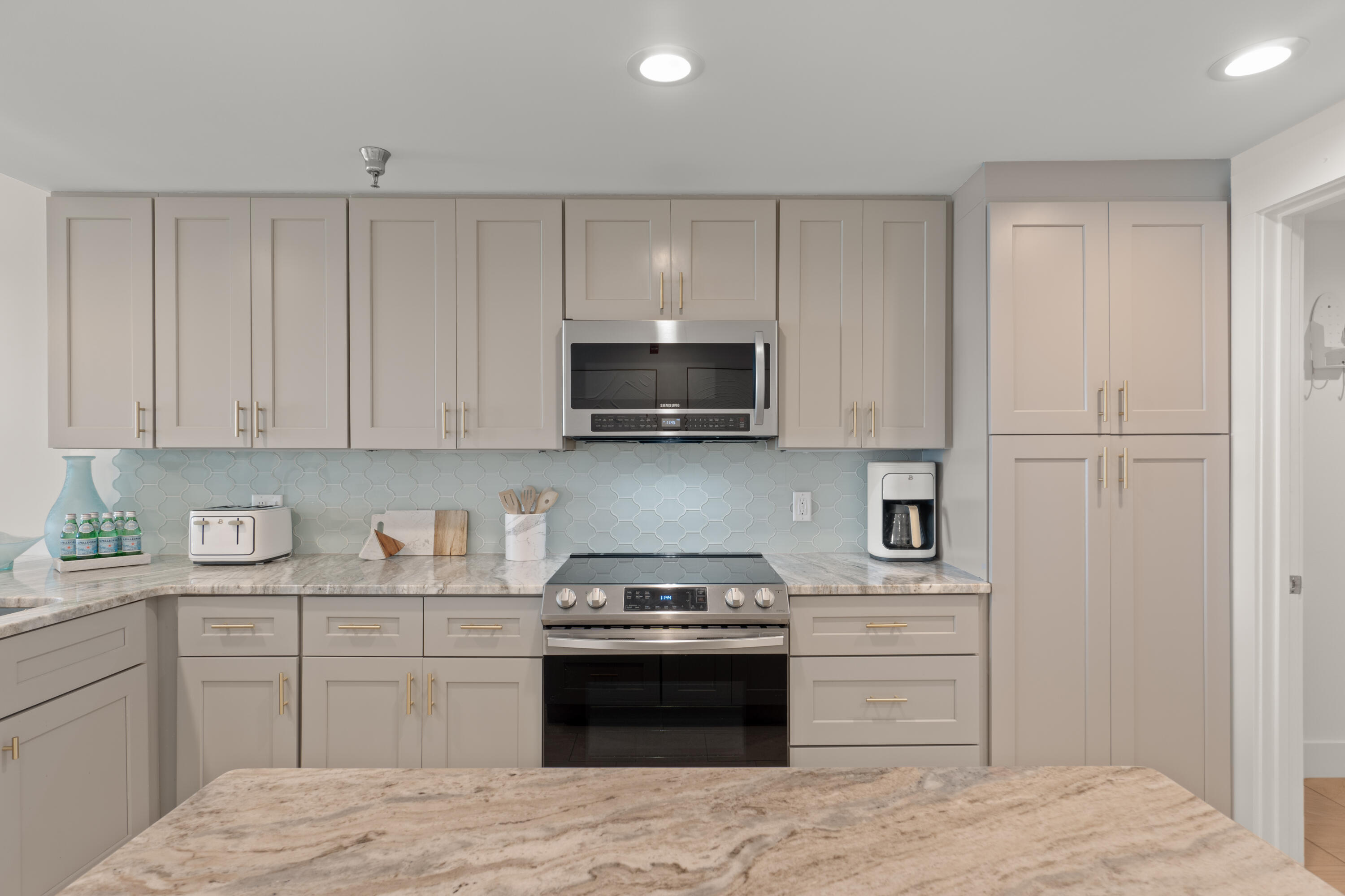 32461 East County Highway 30A, Unit 330 Inlet Beach, FL 32461 - Photo 3 of 31 a kitchen with a stove and a microwave