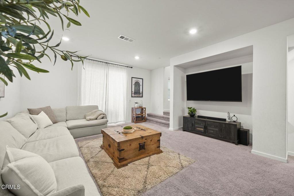586 Apricot Lane Fillmore, CA 93015 - Photo 14 of 38 a living room with furniture and a flat screen tv