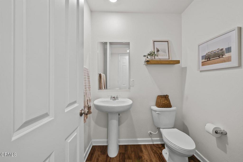 586 Apricot Lane Fillmore, CA 93015 - Photo 16 of 38 a bathroom with a toilet sink and mirror
