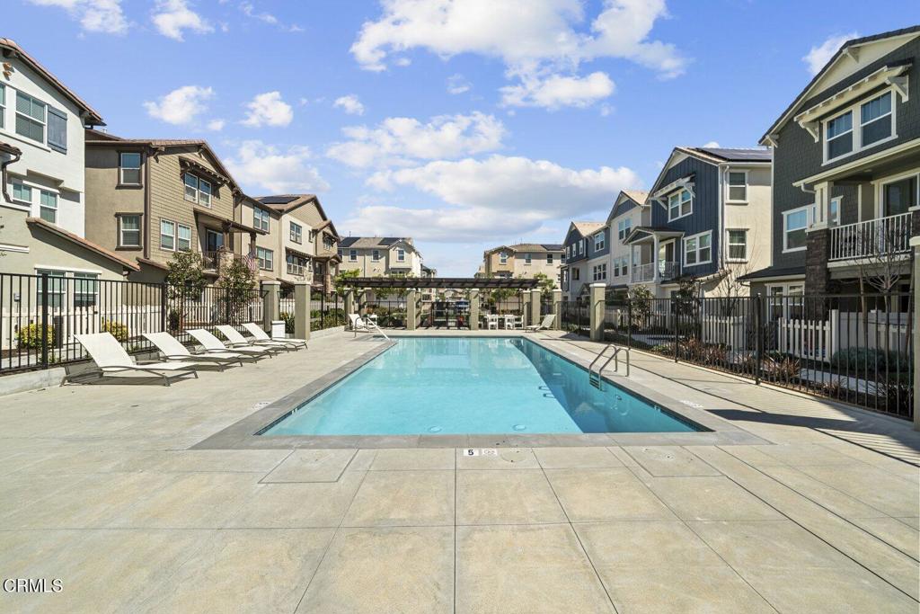 586 Apricot Lane Fillmore, CA 93015 - Photo 31 of 38 a swimming pool with outdoor seating and yard
