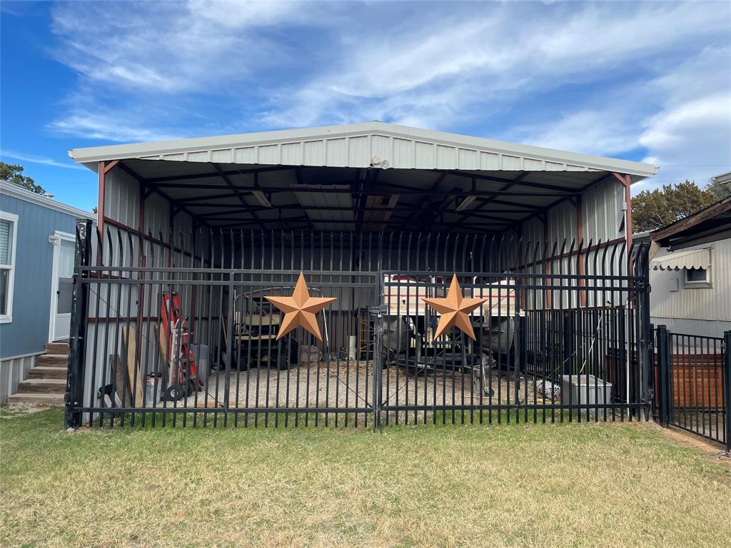 2334 San Bar Road, Unit 71 Graford, TX 76449 - Photo 30 of 40 Look at this amazing carport and fence!