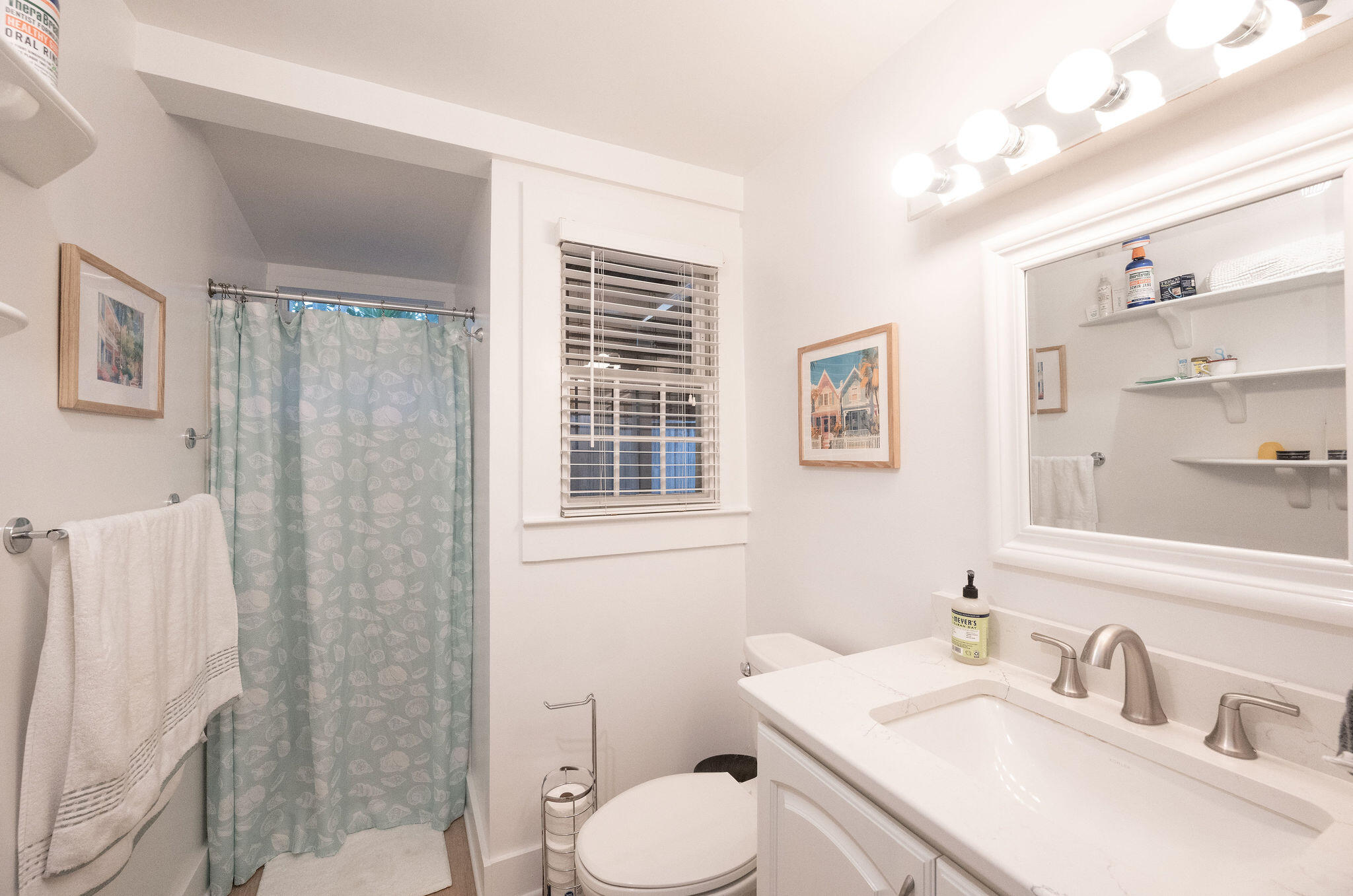 1209 Pearl Street Key West, FL 33040 - Photo 12 of 22 a bathroom with a sink toilet and shower