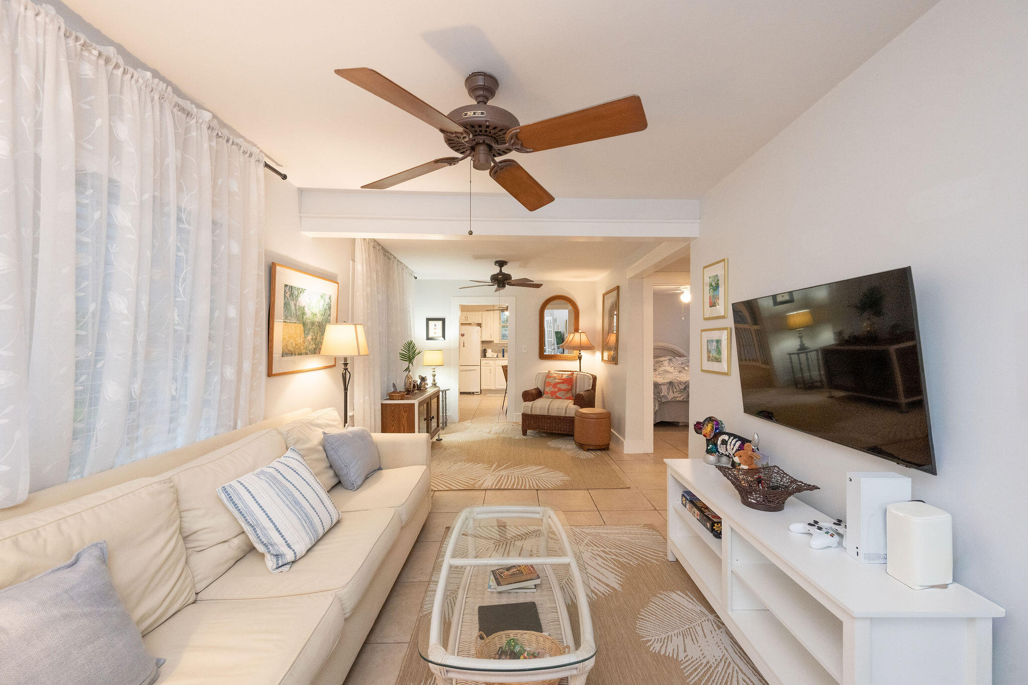 1209 Pearl Street Key West, FL 33040 - Photo 6 of 22 a living room with furniture and a flat screen tv