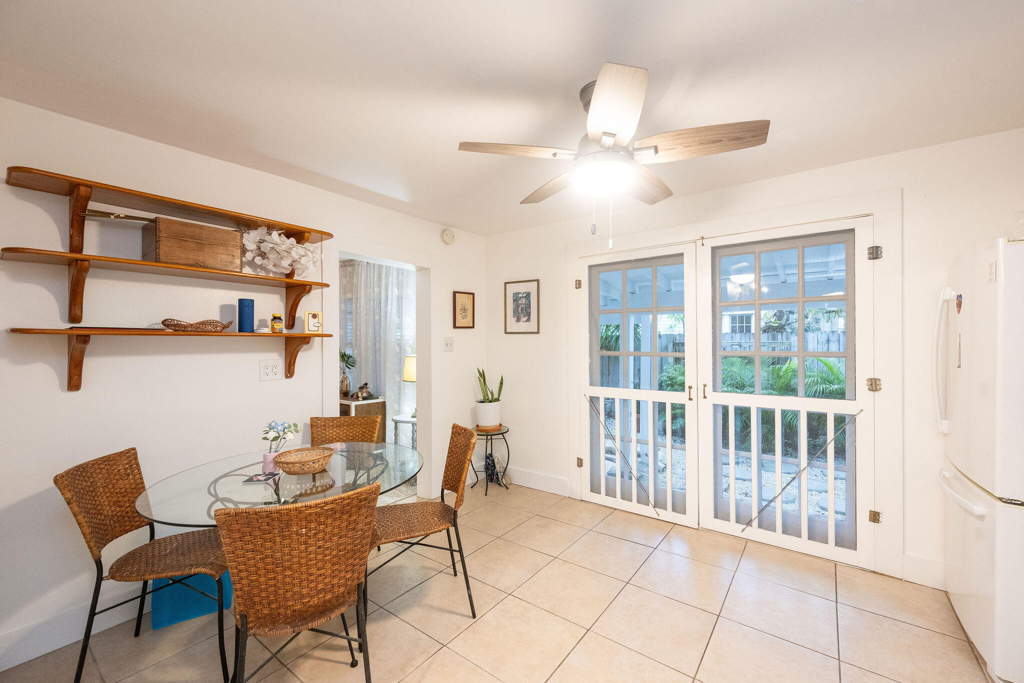 1209 Pearl Street Key West, FL 33040 - Photo 9 of 22 a dining room with furniture and window