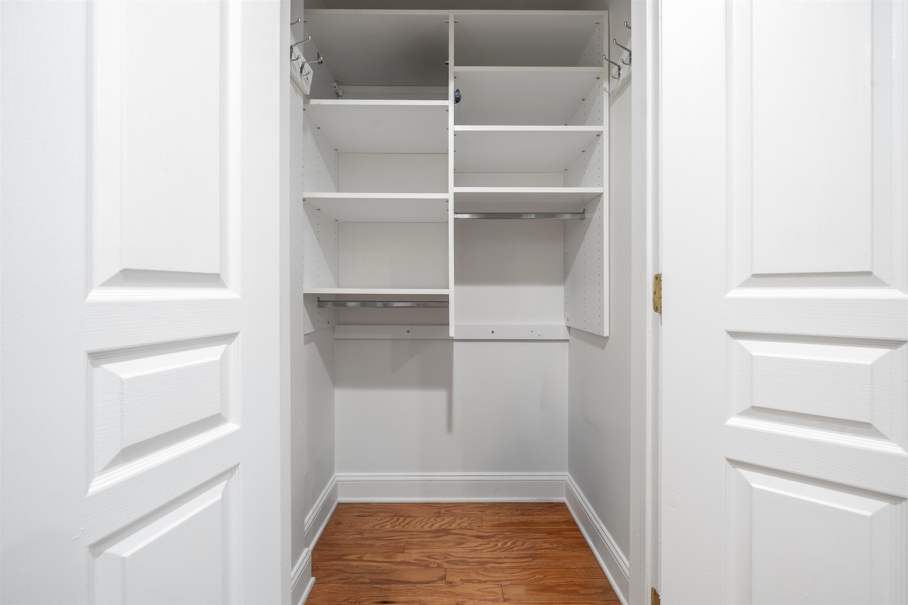 70 Adams Street, Unit 2F Hoboken, NJ 07030 - Photo 11 of 20 a view of walk in closet with empty racks
