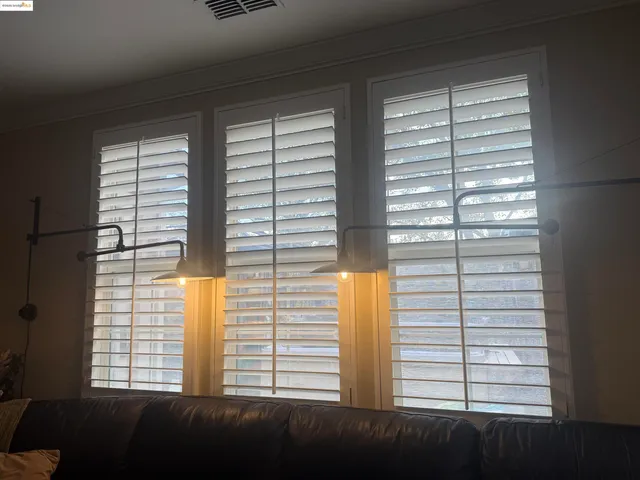 a view of a bedroom with a window