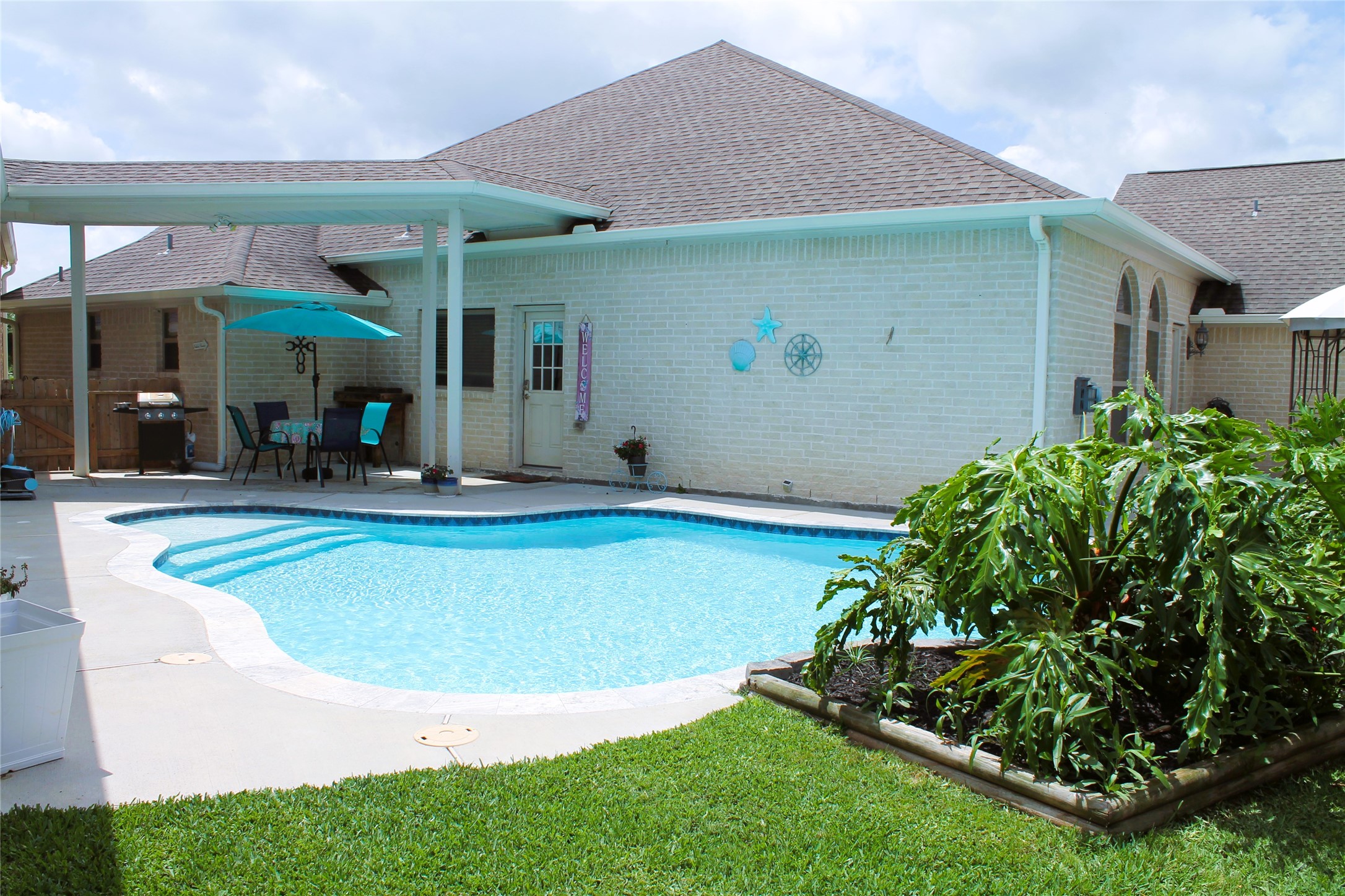 6438 Grapevine Bend Manvel, TX 77578 - Photo 25 of 36 Stunning pool with spa creating a true backyard paradise and no back neighbors