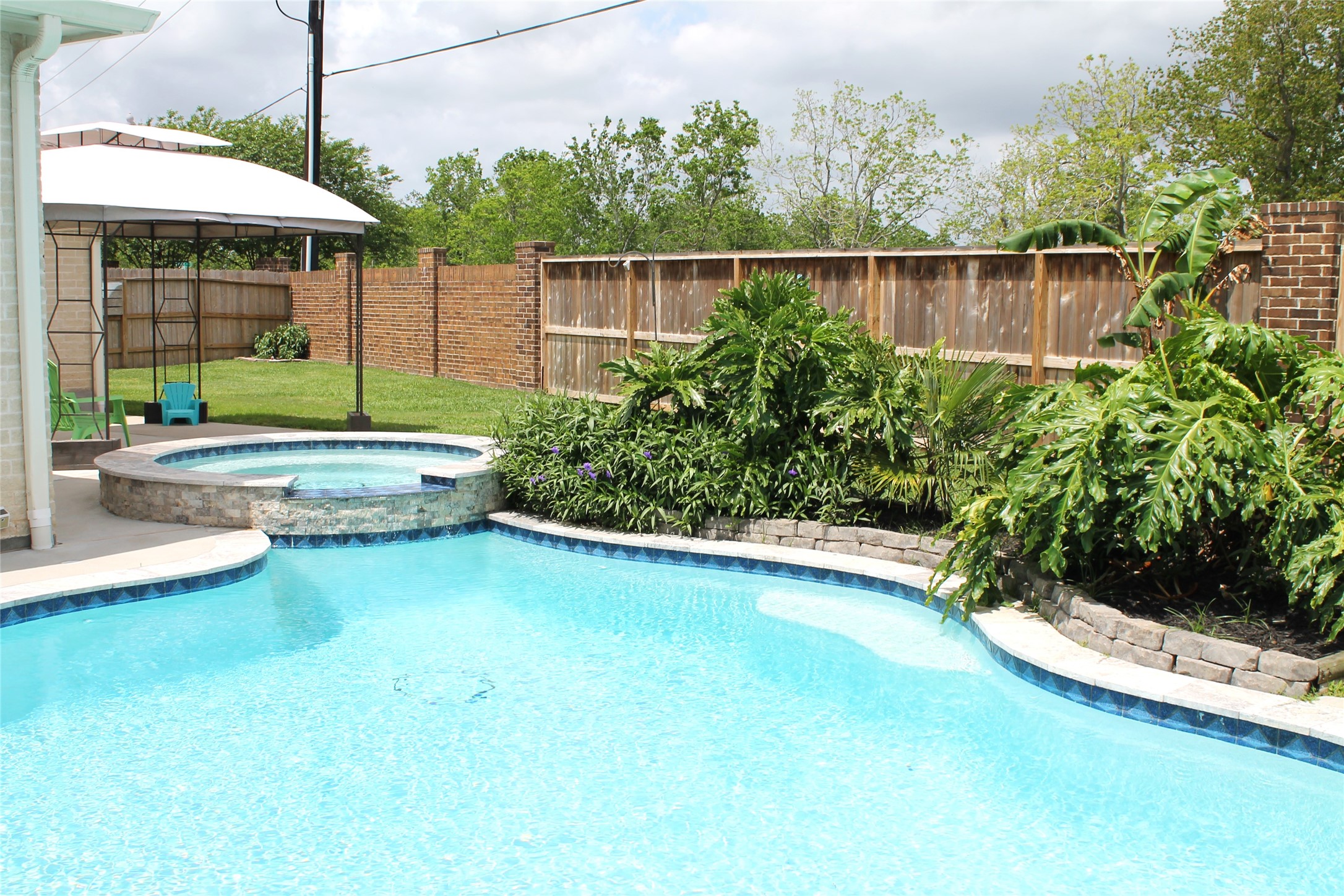 6438 Grapevine Bend Manvel, TX 77578 - Photo 26 of 36 Stunning pool with spa creating a true backyard paradise and no back neighbors