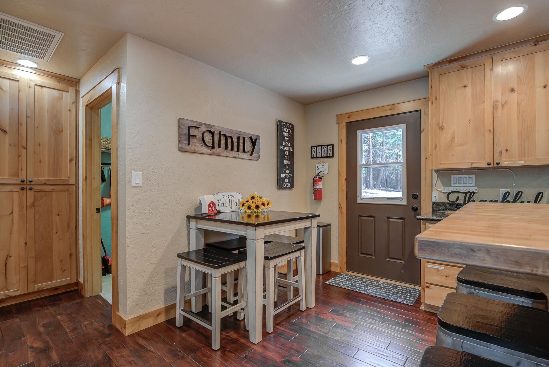 34607 Mountain Haven Road Shingletown, CA 96088 - Photo 19 of 63 a kitchen that has a lot of cabinets a sink and appliances in it