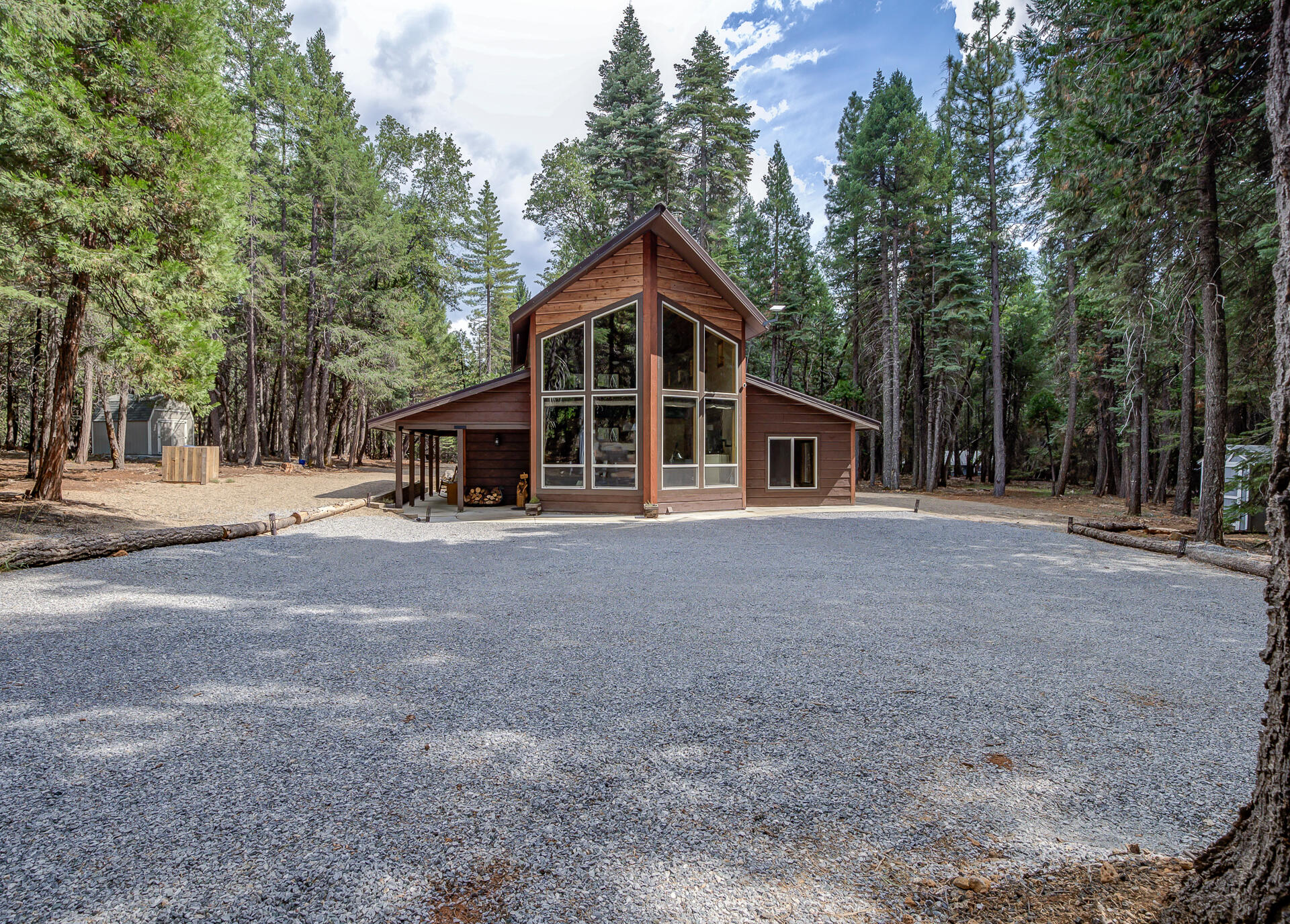 34607 Mountain Haven Road Shingletown, CA 96088 - Photo 2 of 63 a front view of a house with a yard