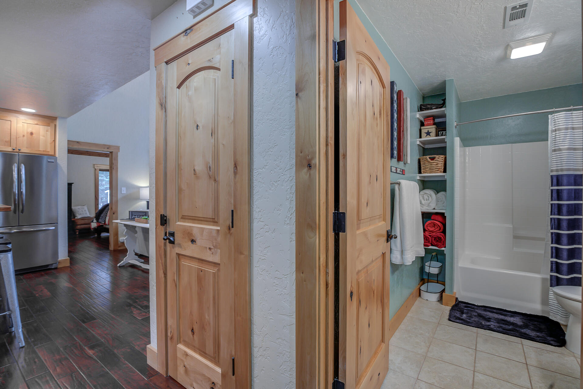 34607 Mountain Haven Road Shingletown, CA 96088 - Photo 24 of 63 a very nice looking room with a wooden floor and a fireplace