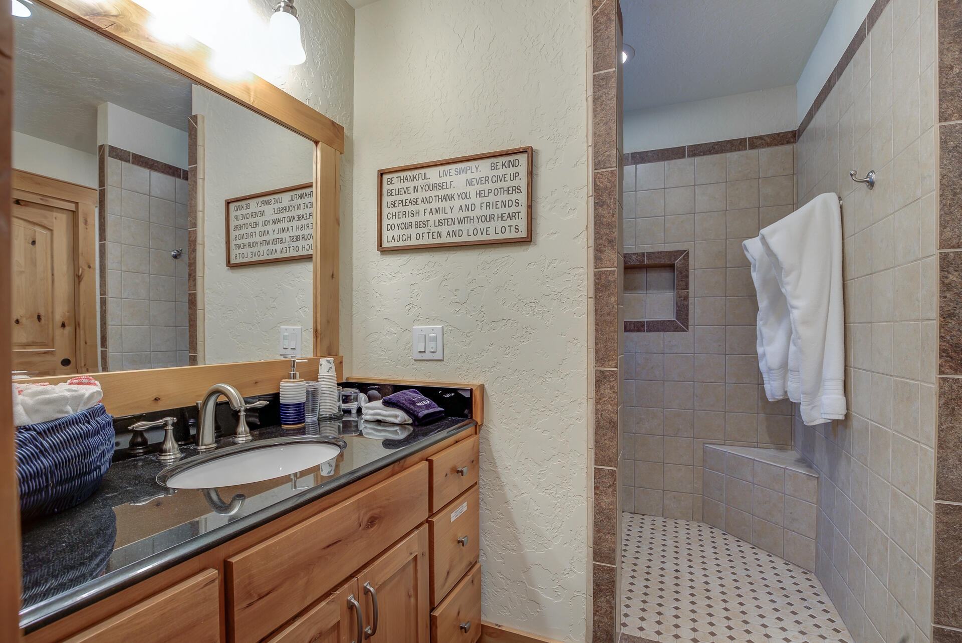 34607 Mountain Haven Road Shingletown, CA 96088 - Photo 32 of 63 a bathroom with a sink and a mirror