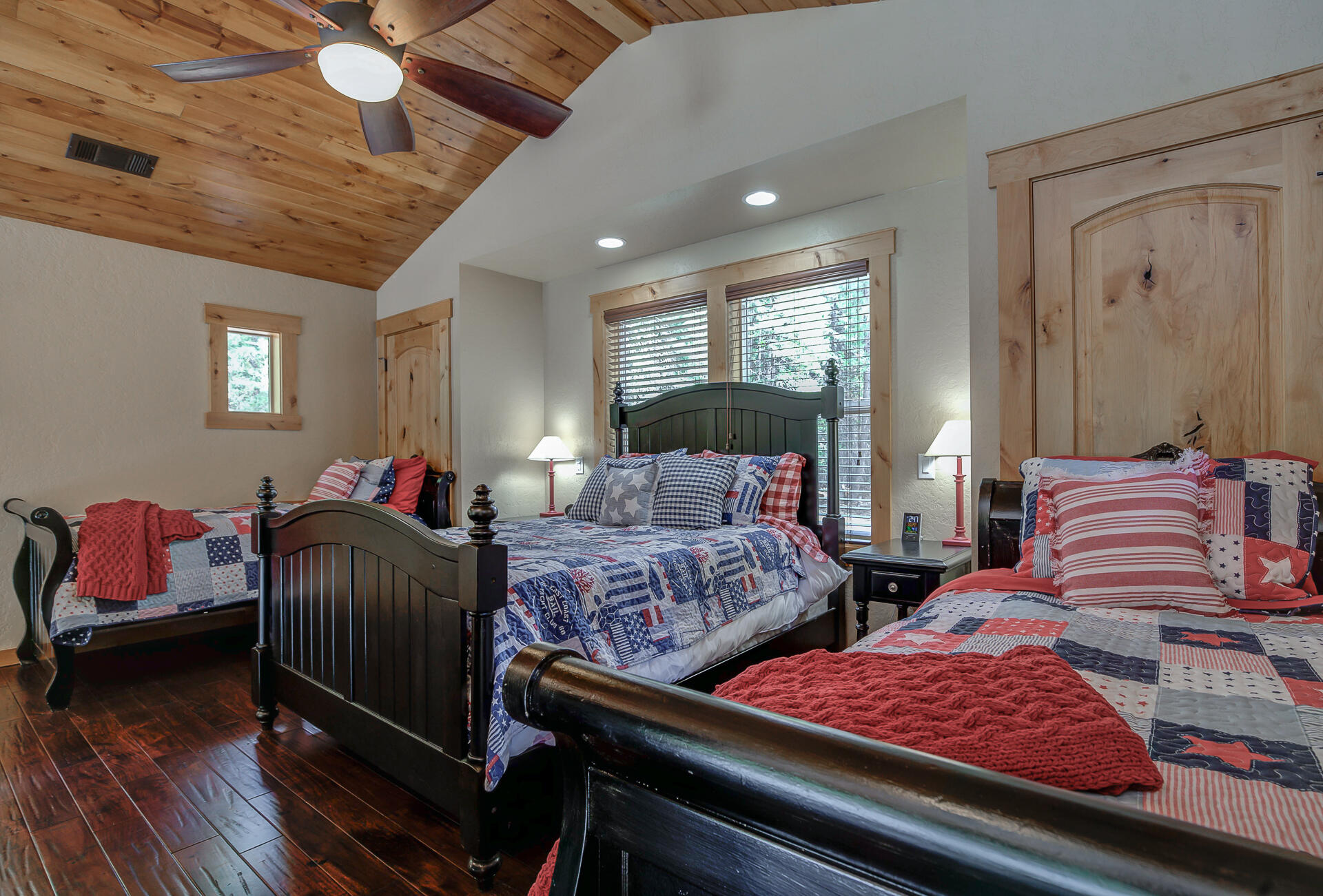 34607 Mountain Haven Road Shingletown, CA 96088 - Photo 35 of 63 a bedroom with two beds and a dresser with wooden floor