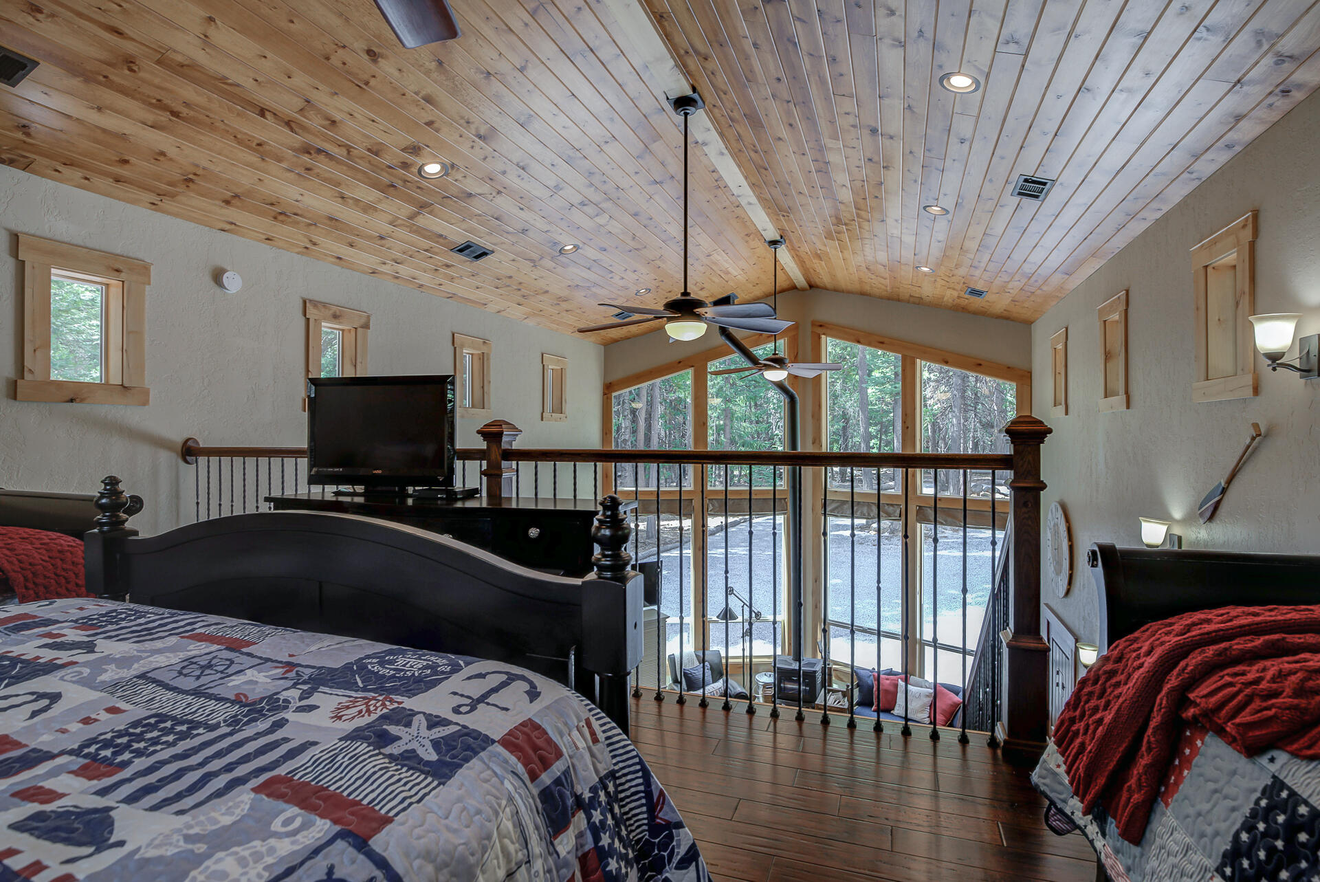 34607 Mountain Haven Road Shingletown, CA 96088 - Photo 36 of 63 a bedroom with a bed and a tv