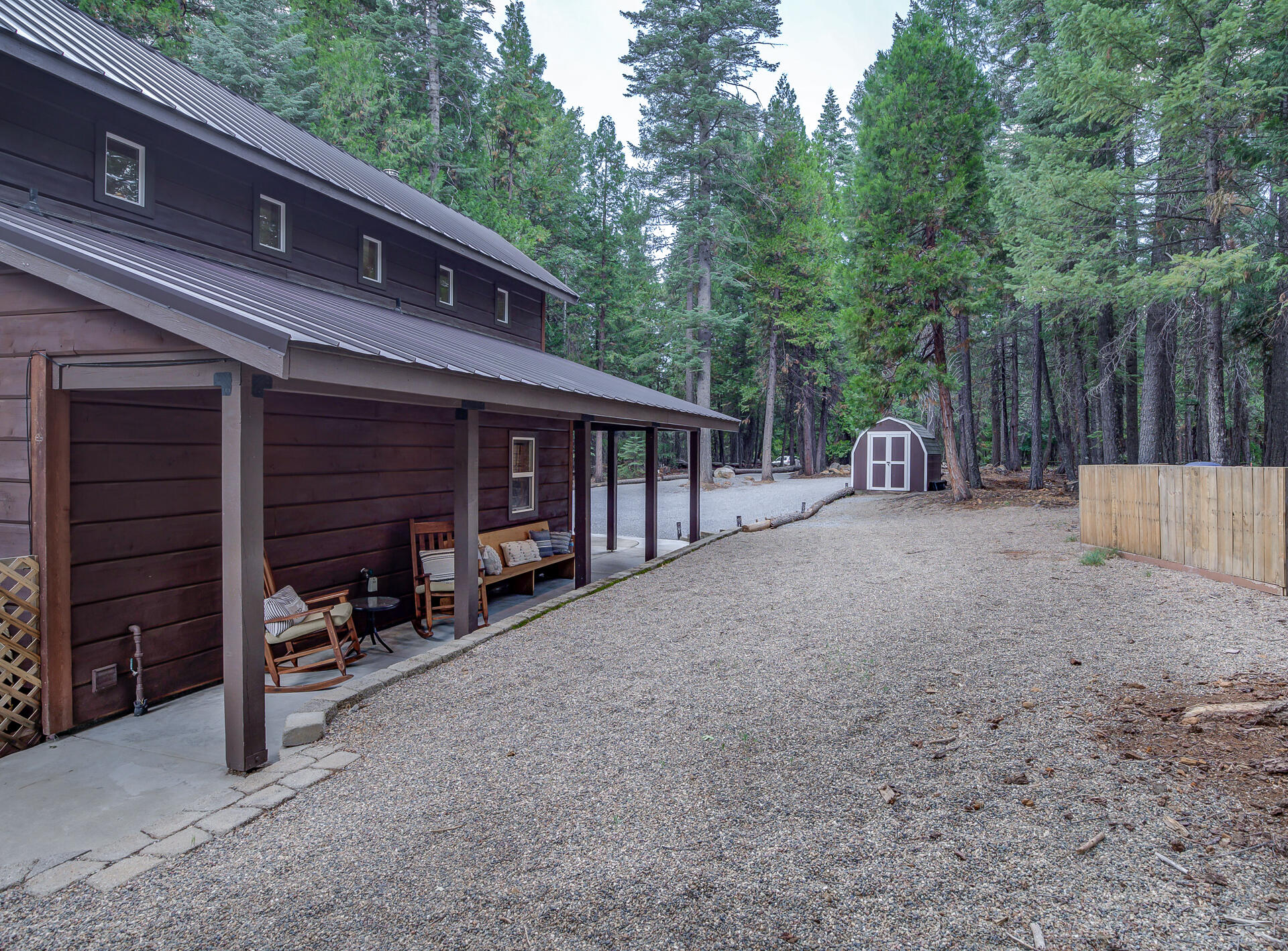 34607 Mountain Haven Road Shingletown, CA 96088 - Photo 46 of 63 a view of a house with backyard and chairs
