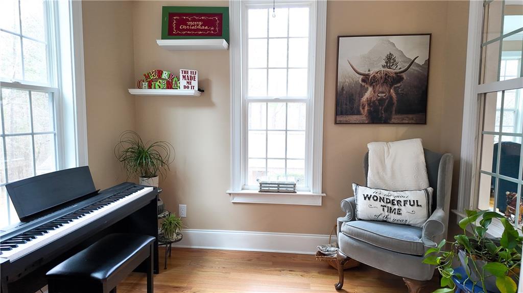 8179 Pineview Court Villa Rica, GA 30180 - Photo 12 of 38 a living room with furniture and a window