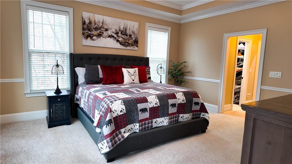 8179 Pineview Court Villa Rica, GA 30180 - Photo 18 of 38 a bedroom with a bed and a window