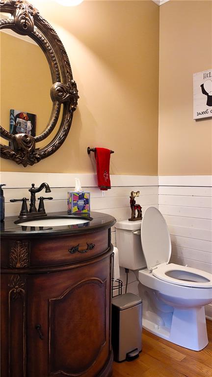 8179 Pineview Court Villa Rica, GA 30180 - Photo 21 of 38 a bathroom with a toilet a sink and mirror