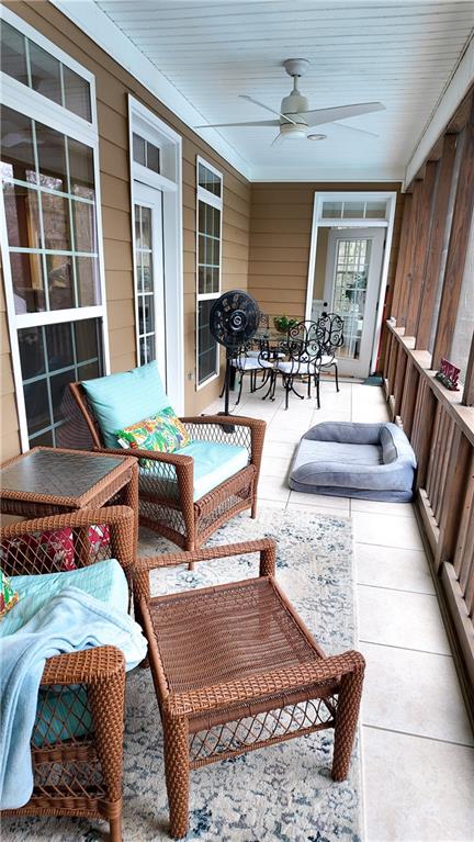 8179 Pineview Court Villa Rica, GA 30180 - Photo 23 of 38 a living room with furniture fireplace and wooden floor