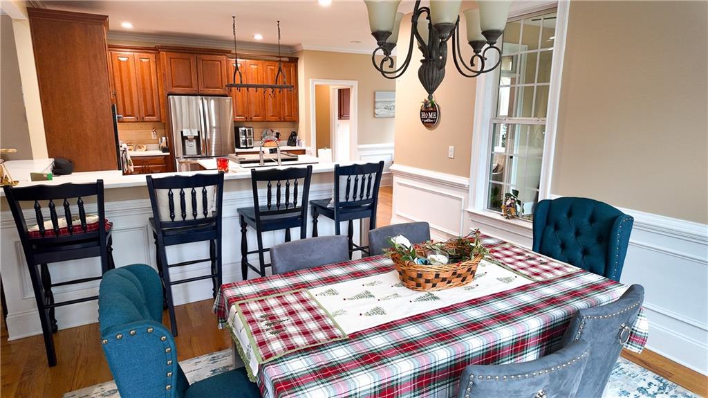 8179 Pineview Court Villa Rica, GA 30180 - Photo 10 of 38 a view of a dining room with furniture window and wooden floor