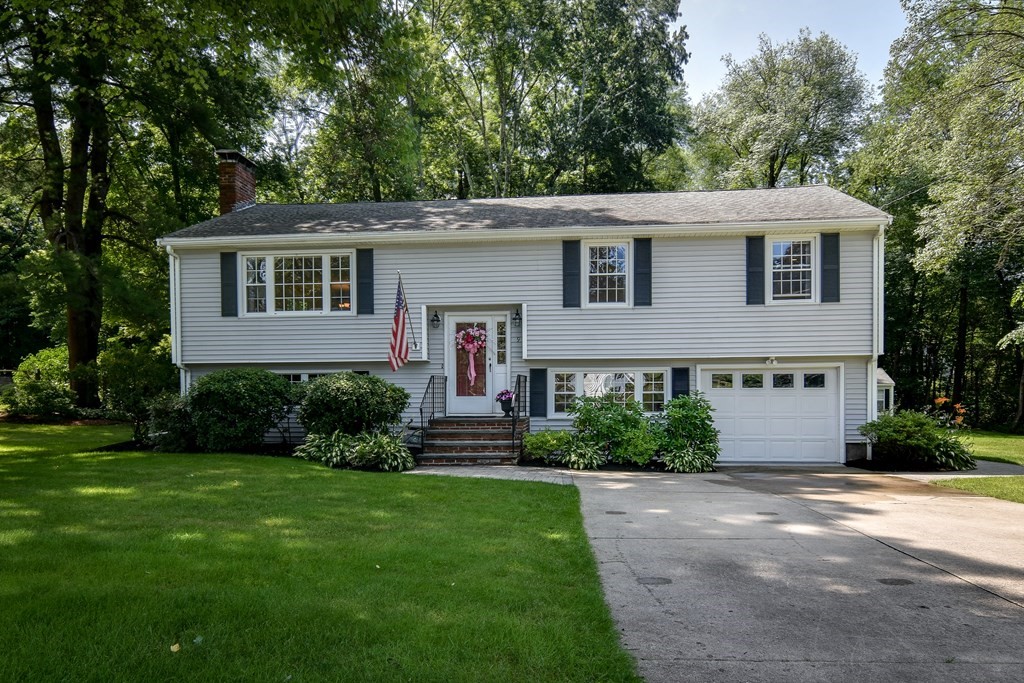 9 Longmeadow Road Medfield, MA 02052 - Photo 1 of 31 a front view of a house with a yard